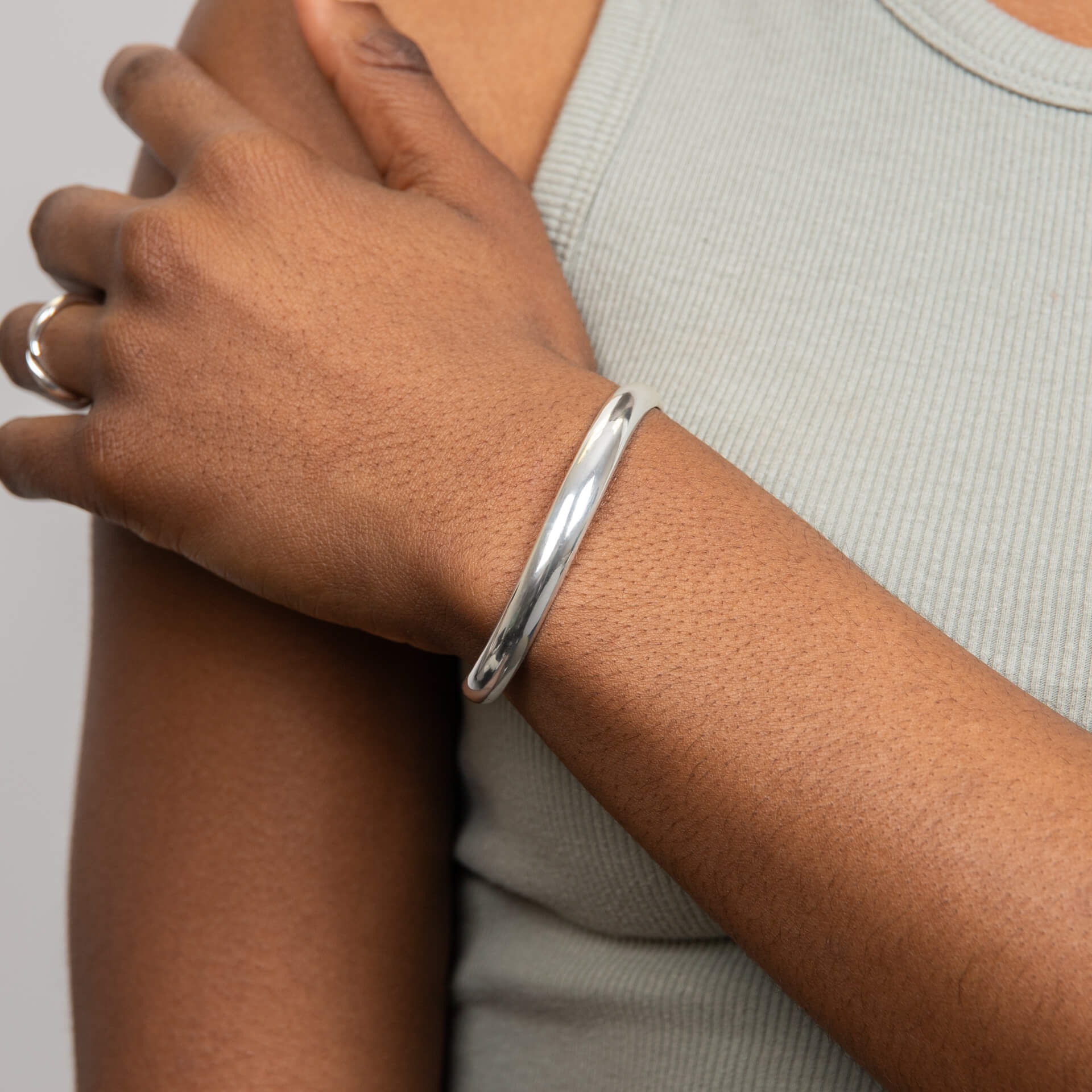 Open Ribbon Twist Bangle