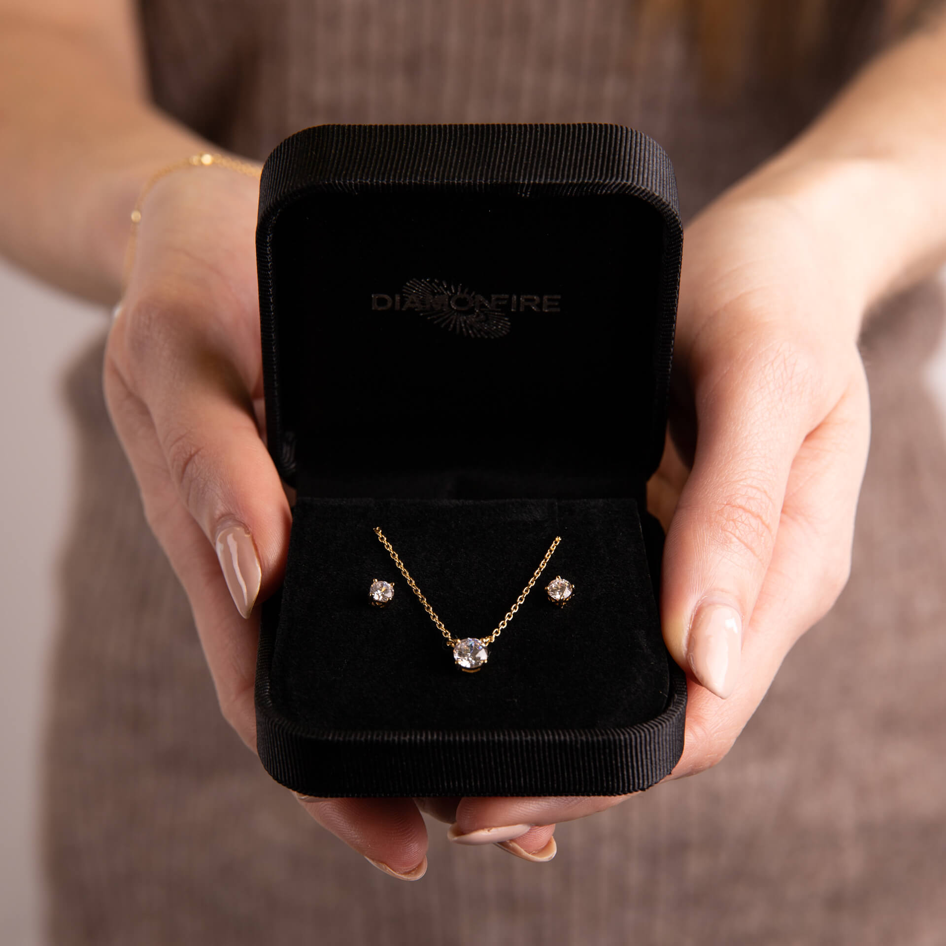 Four Claw Carat Stud Earrings