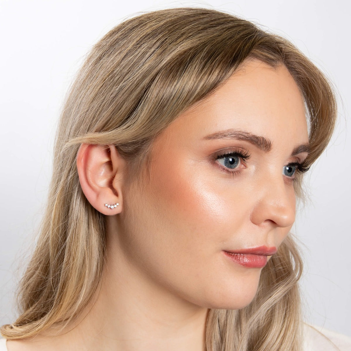 Curved Bar Stud Earrings with Graduated Cubic Zirconia Stones