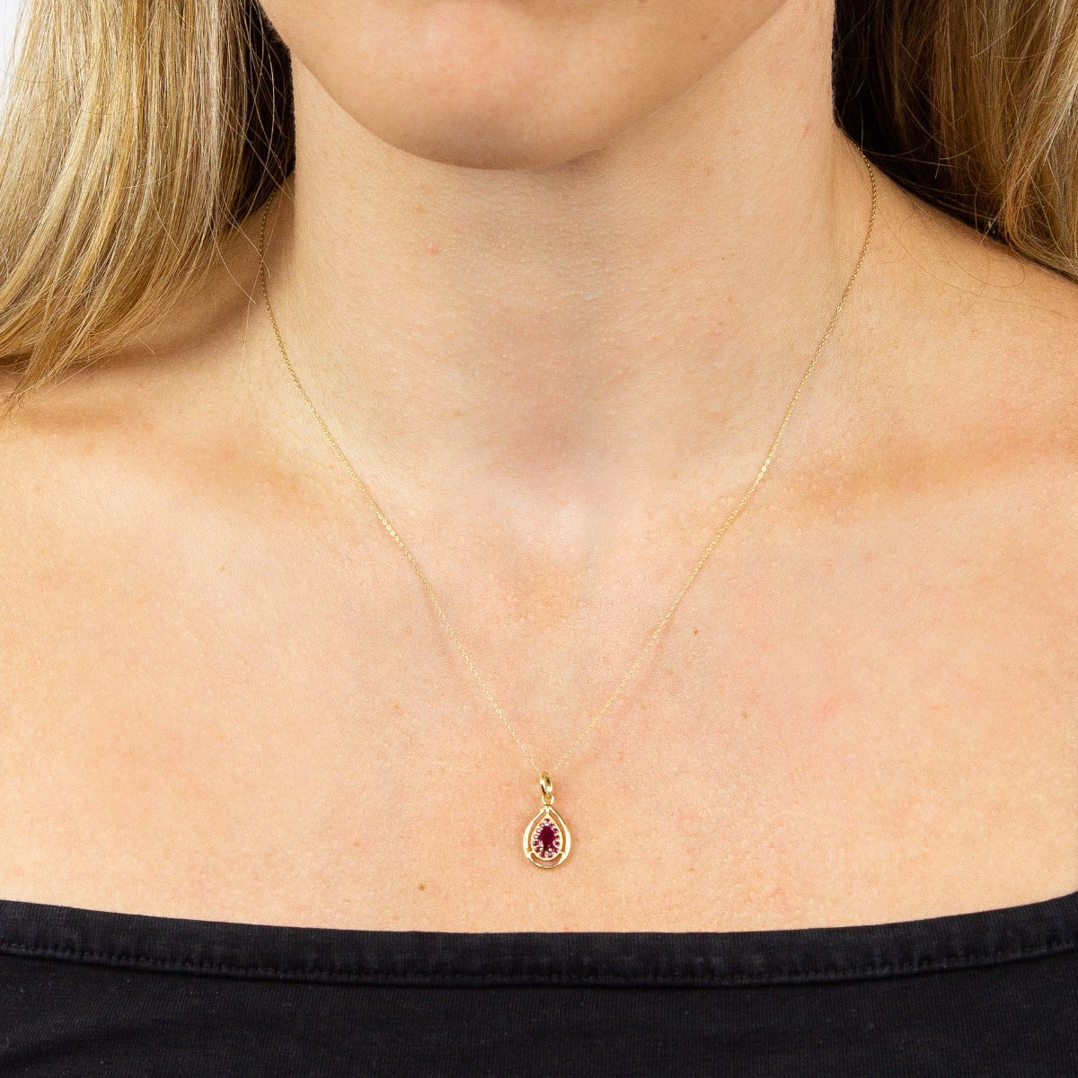 Cut Out Teardrop Pendant with Precious Stone
