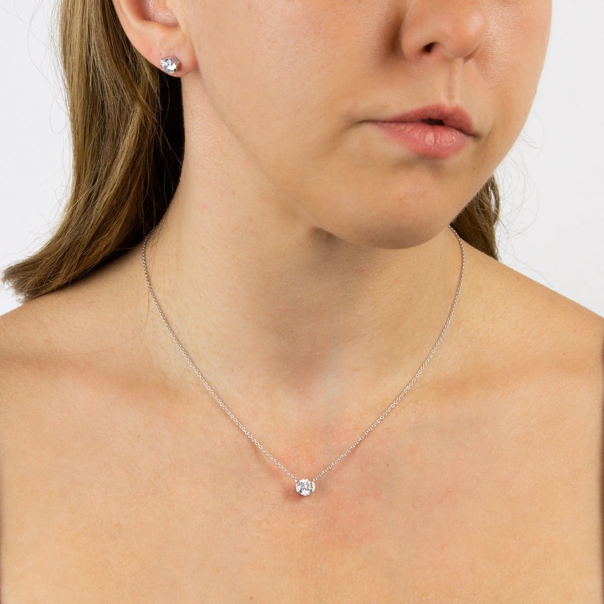 Semi Bezel Set Zirconia Stud Earrings