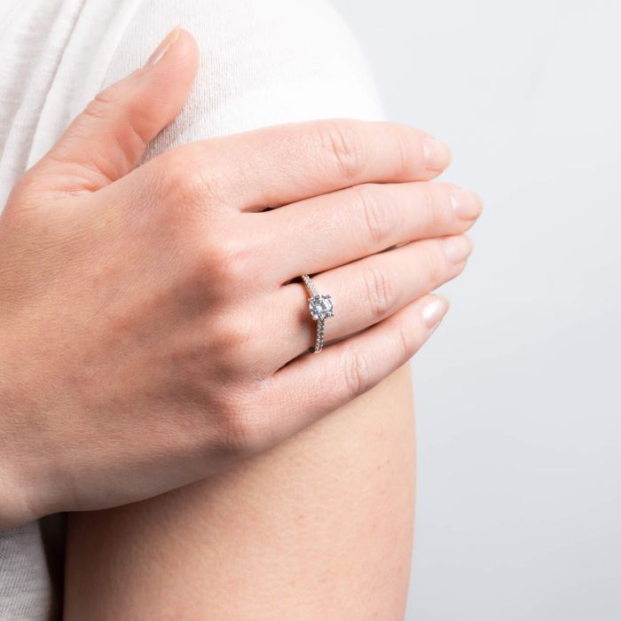 Oval Cut Solitaire Ring with Pave Shoulders