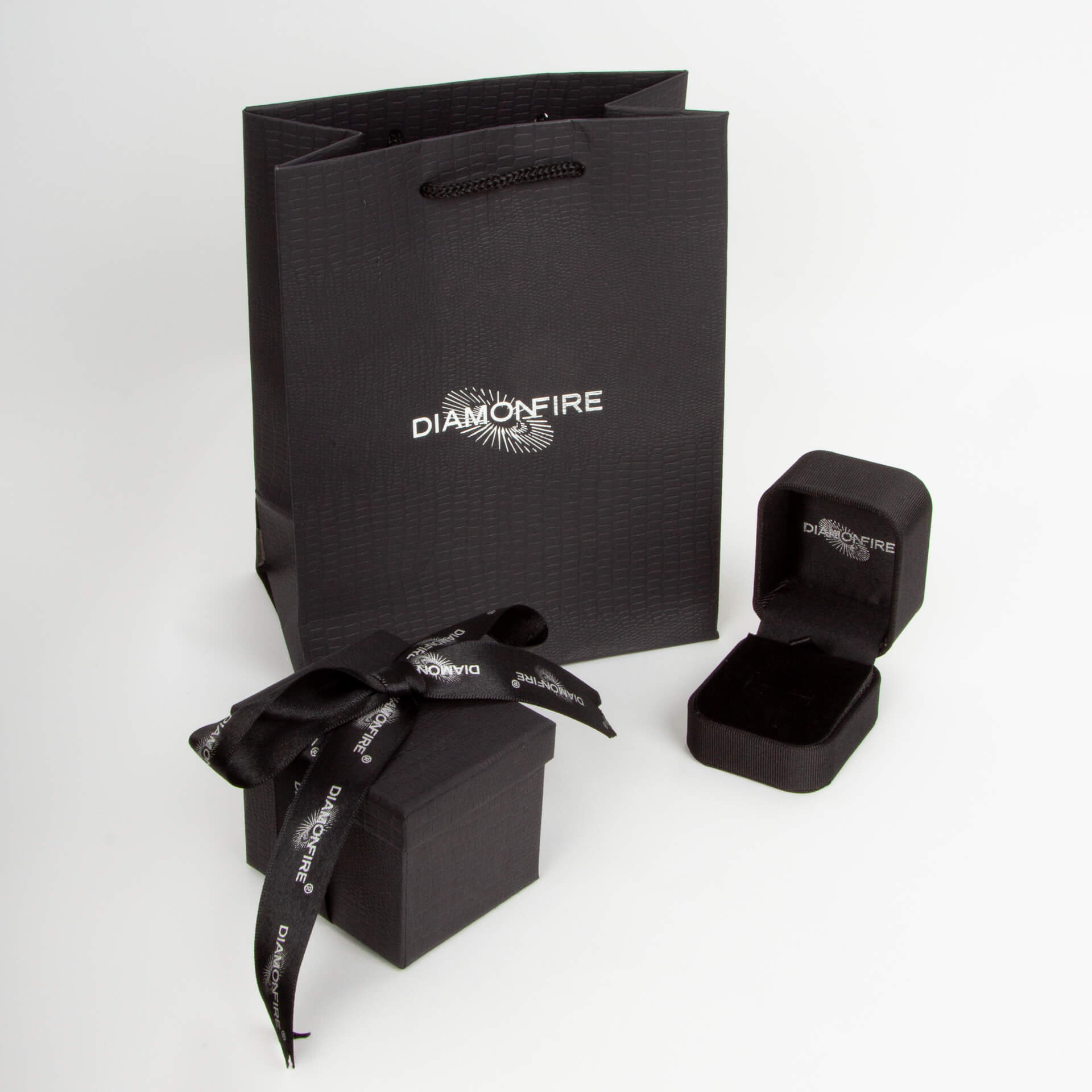 Four Claw Carat Stud Earrings