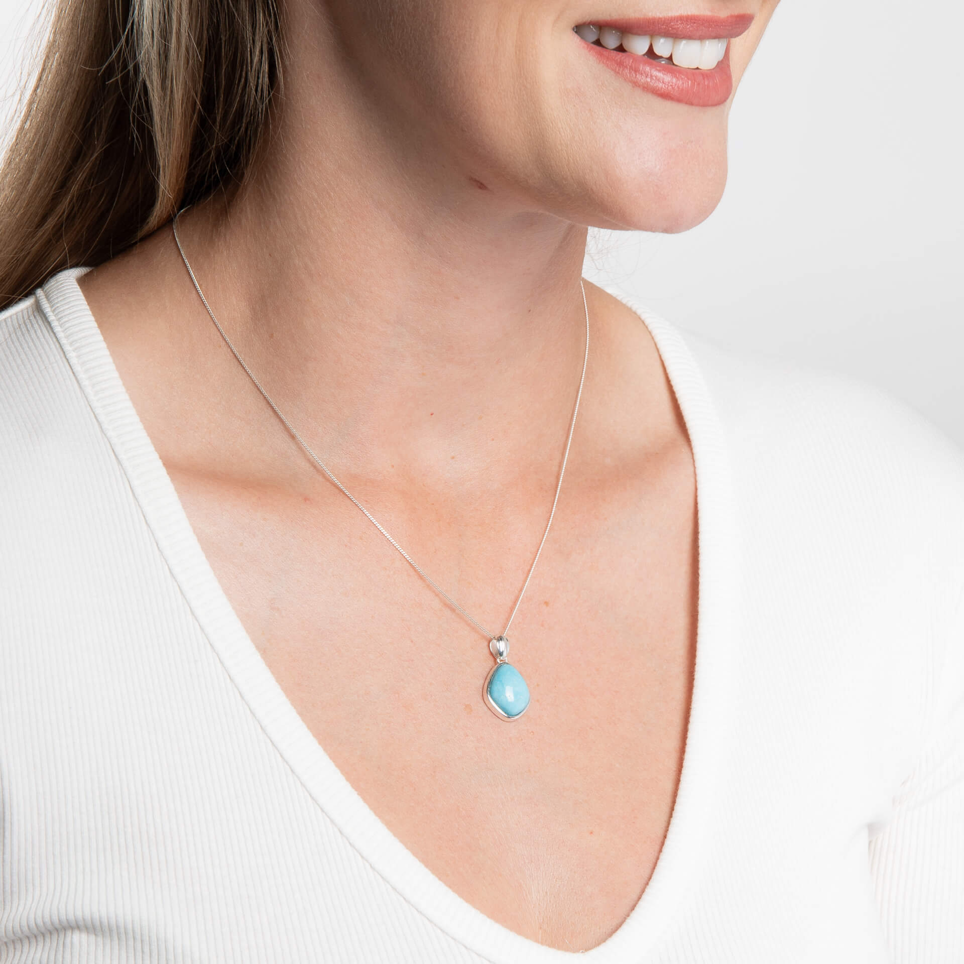 Bezel Set Blue Magnesite Drop Pendant