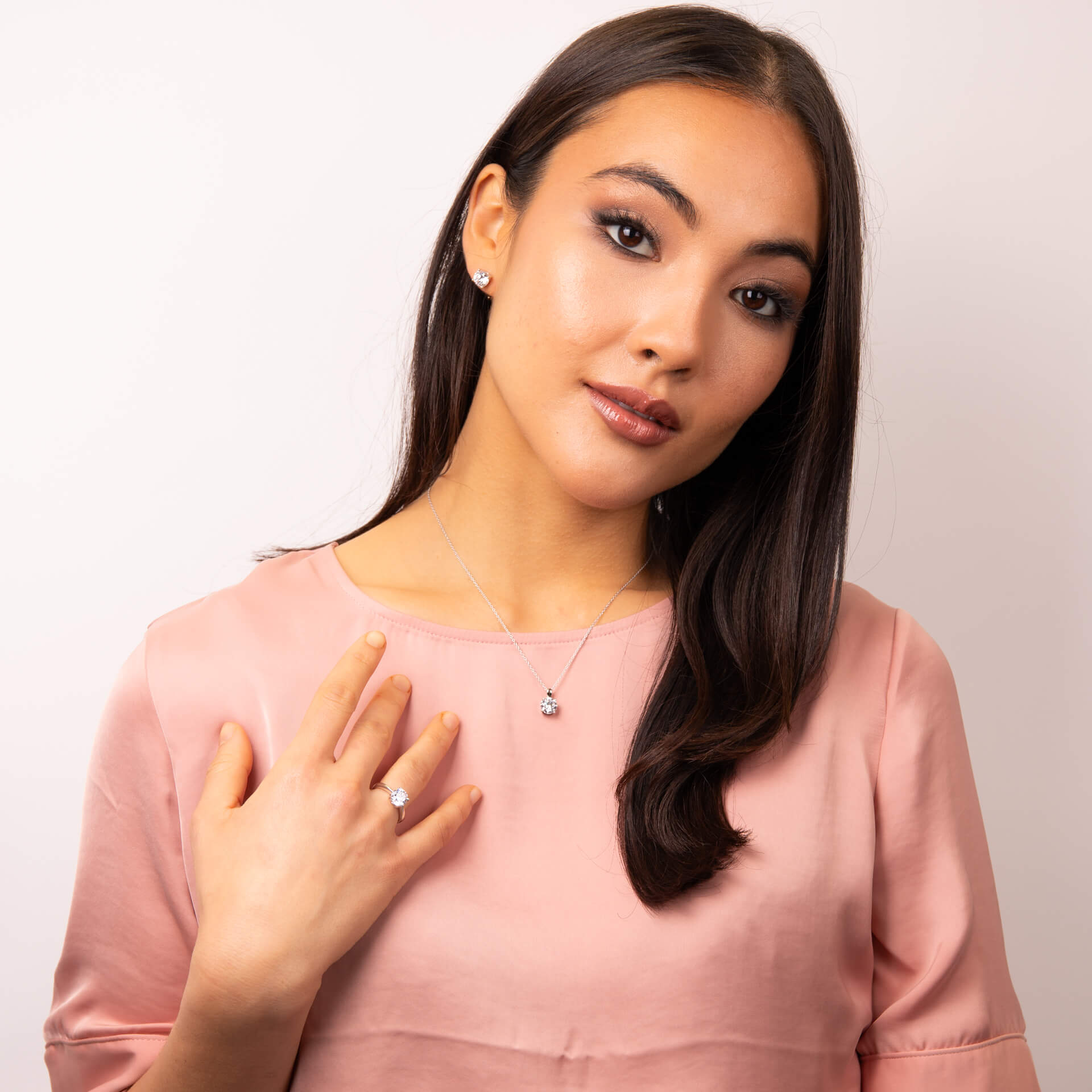 Four Claw Carat Stud Earrings