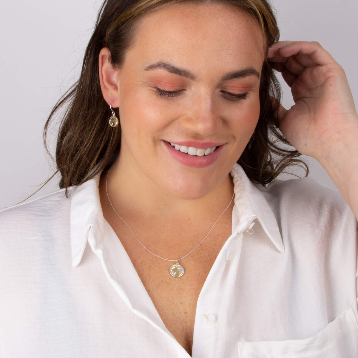 World Pendant with Yellow Gold Plated Disc