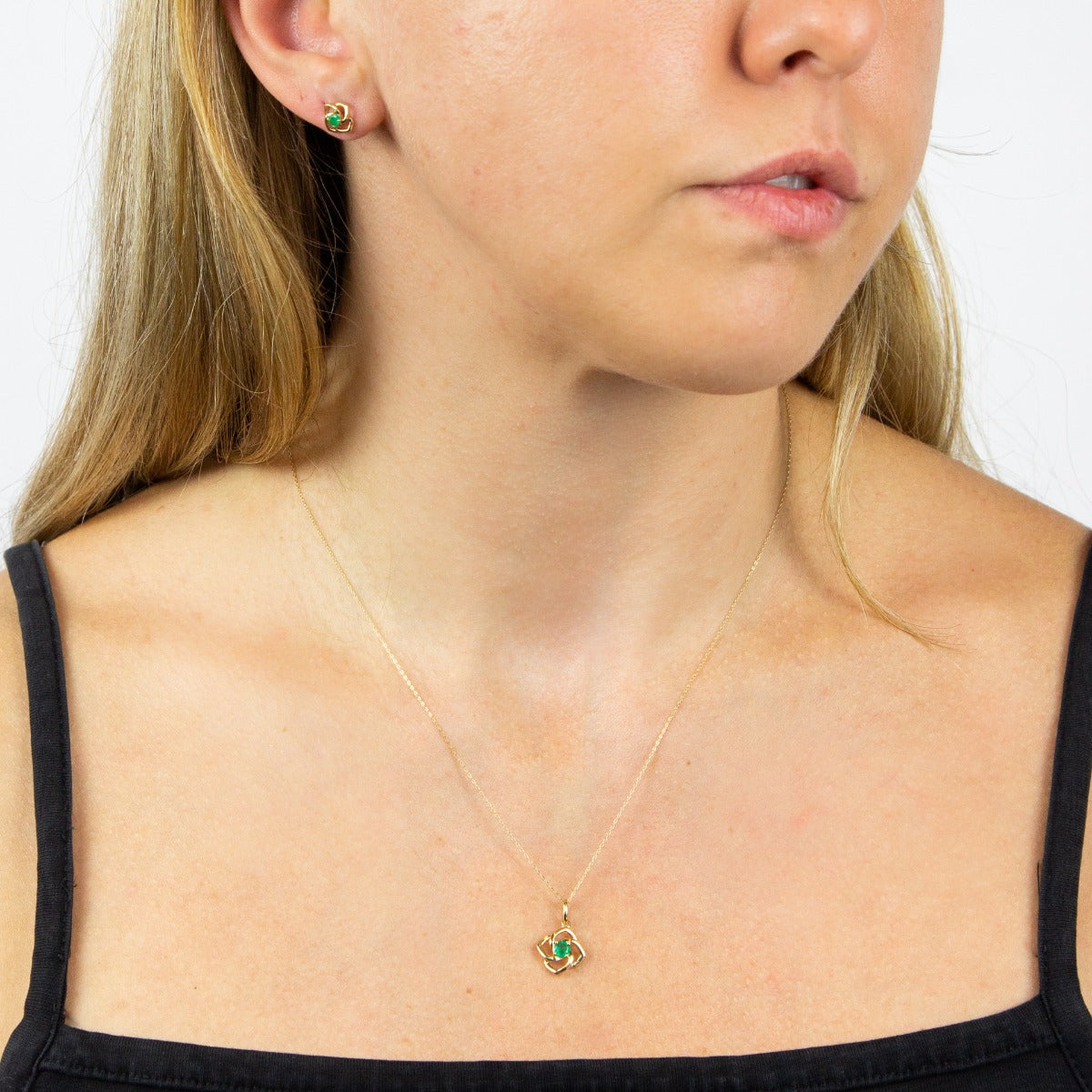 Cut Out Flower Stud Earrings with Emerald