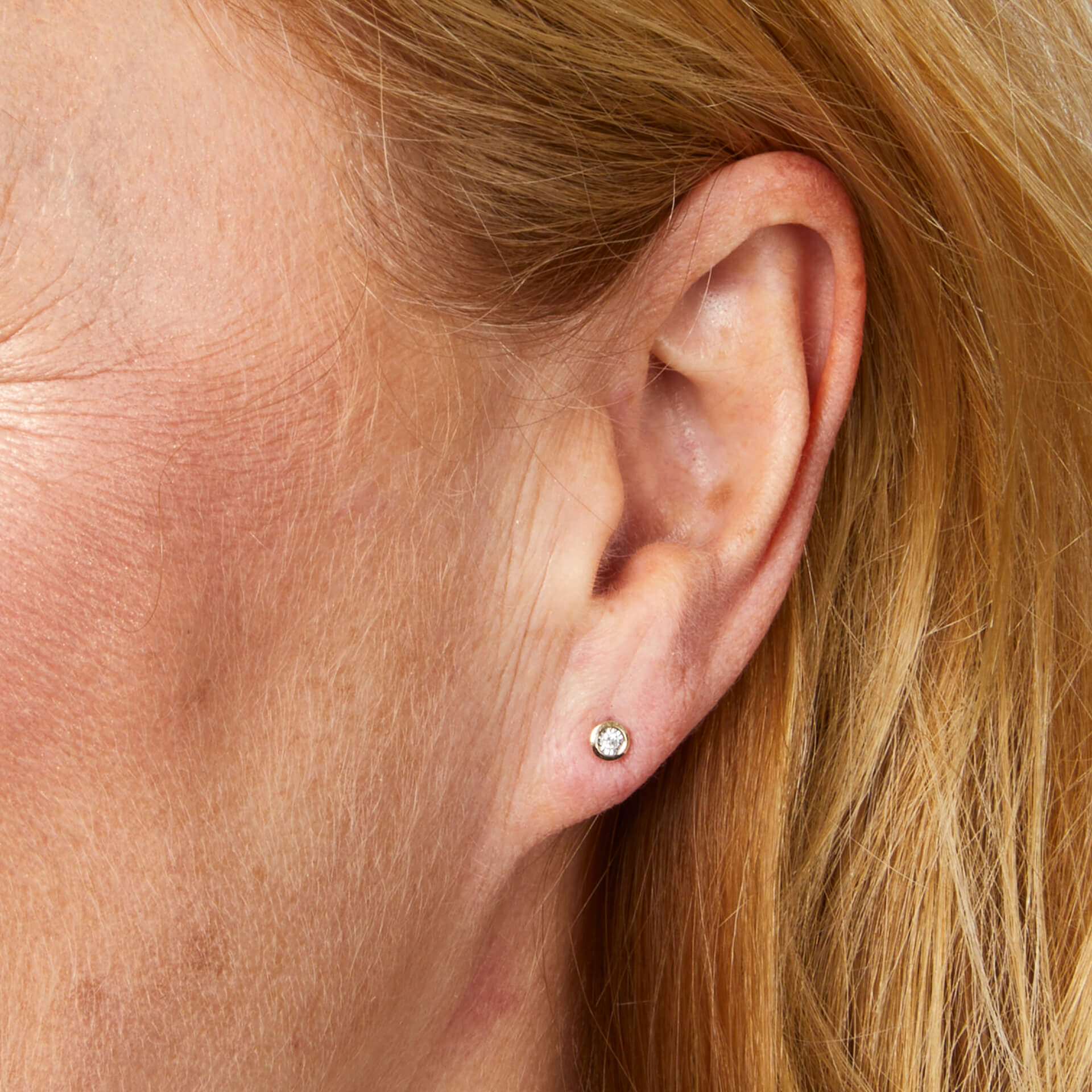 Rounded Bezel Diamond Stud Earrings