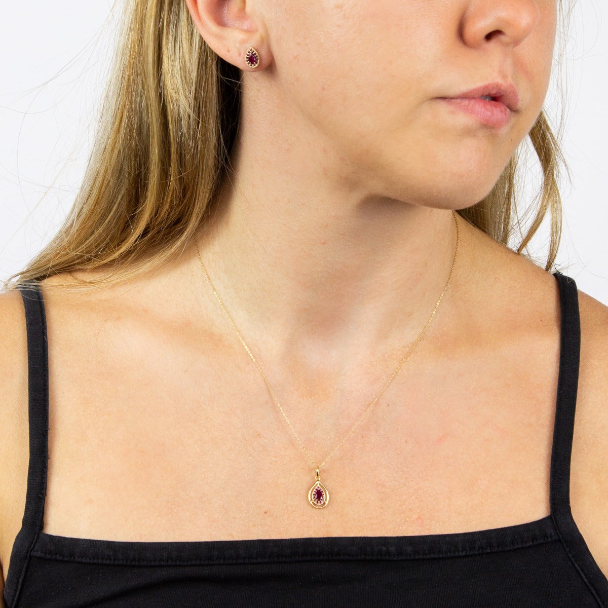 Cut Out Teardrop Pendant with Precious Stone