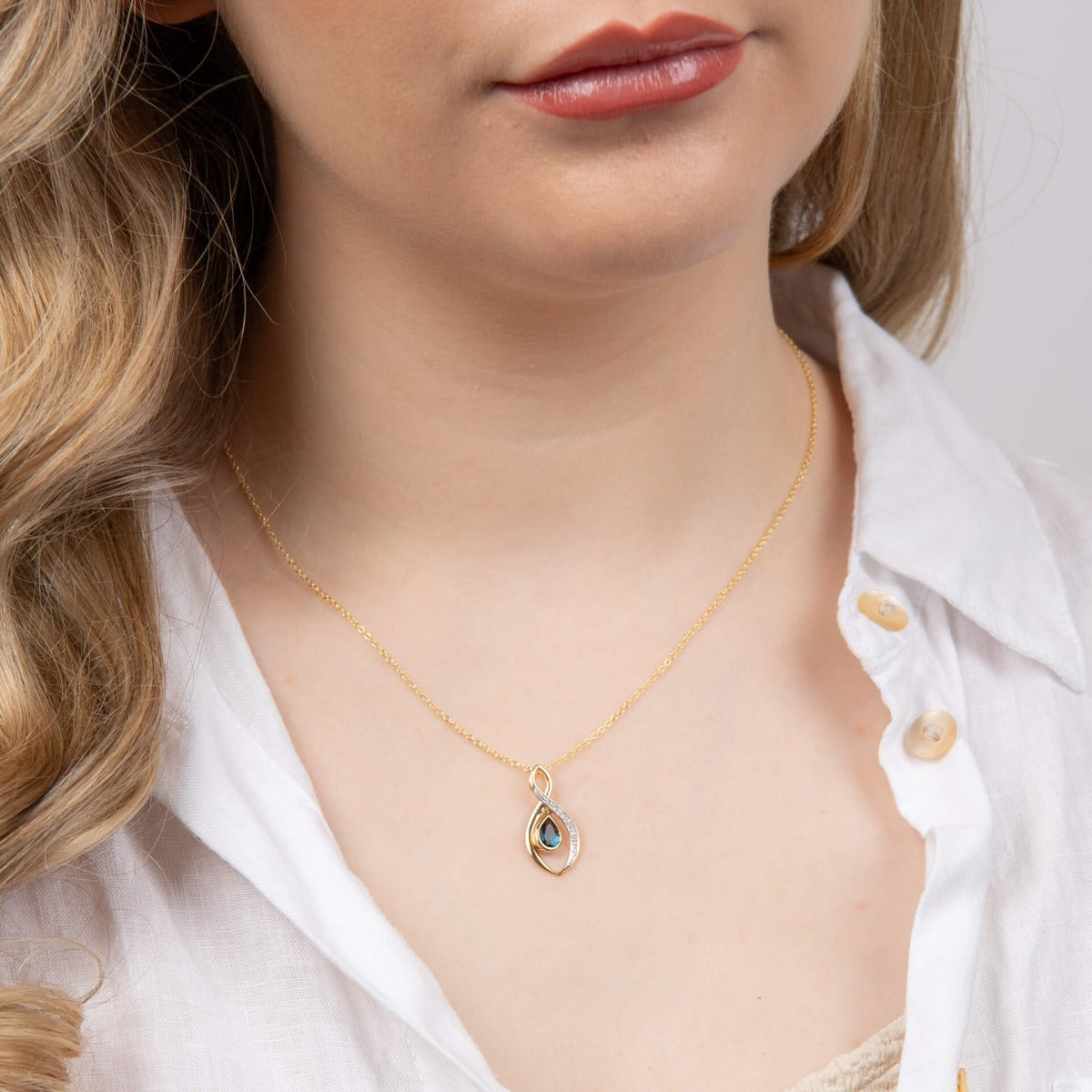 Twist Teardrop Blue Topaz Pendant with Diamond