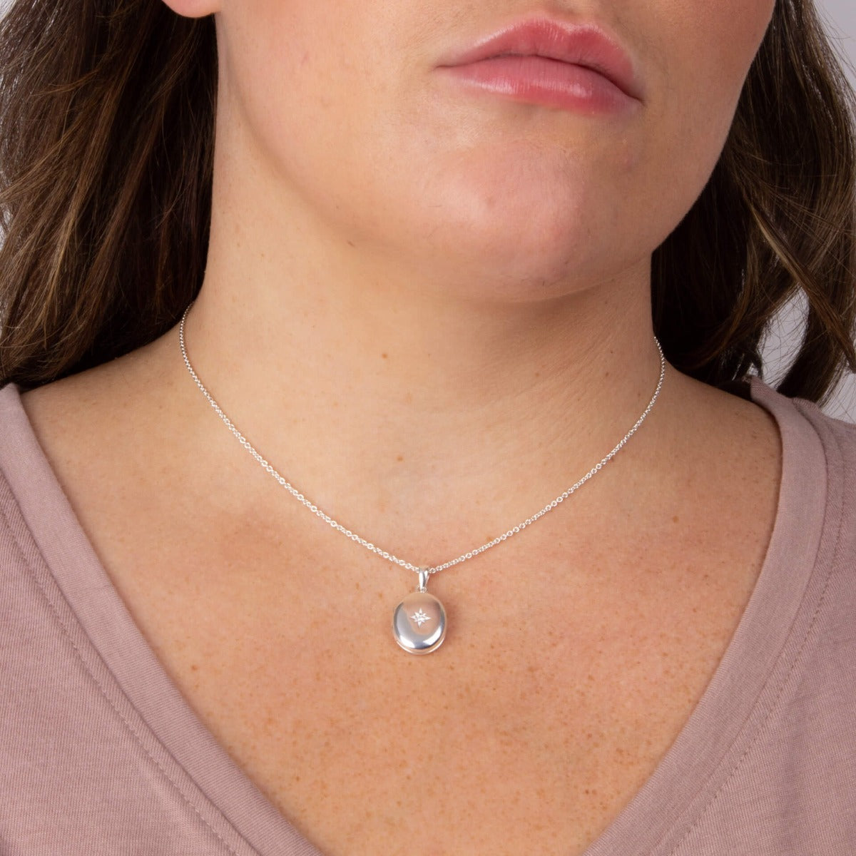 Oval Locket Pendant with Starburst Cubic Zirconia
