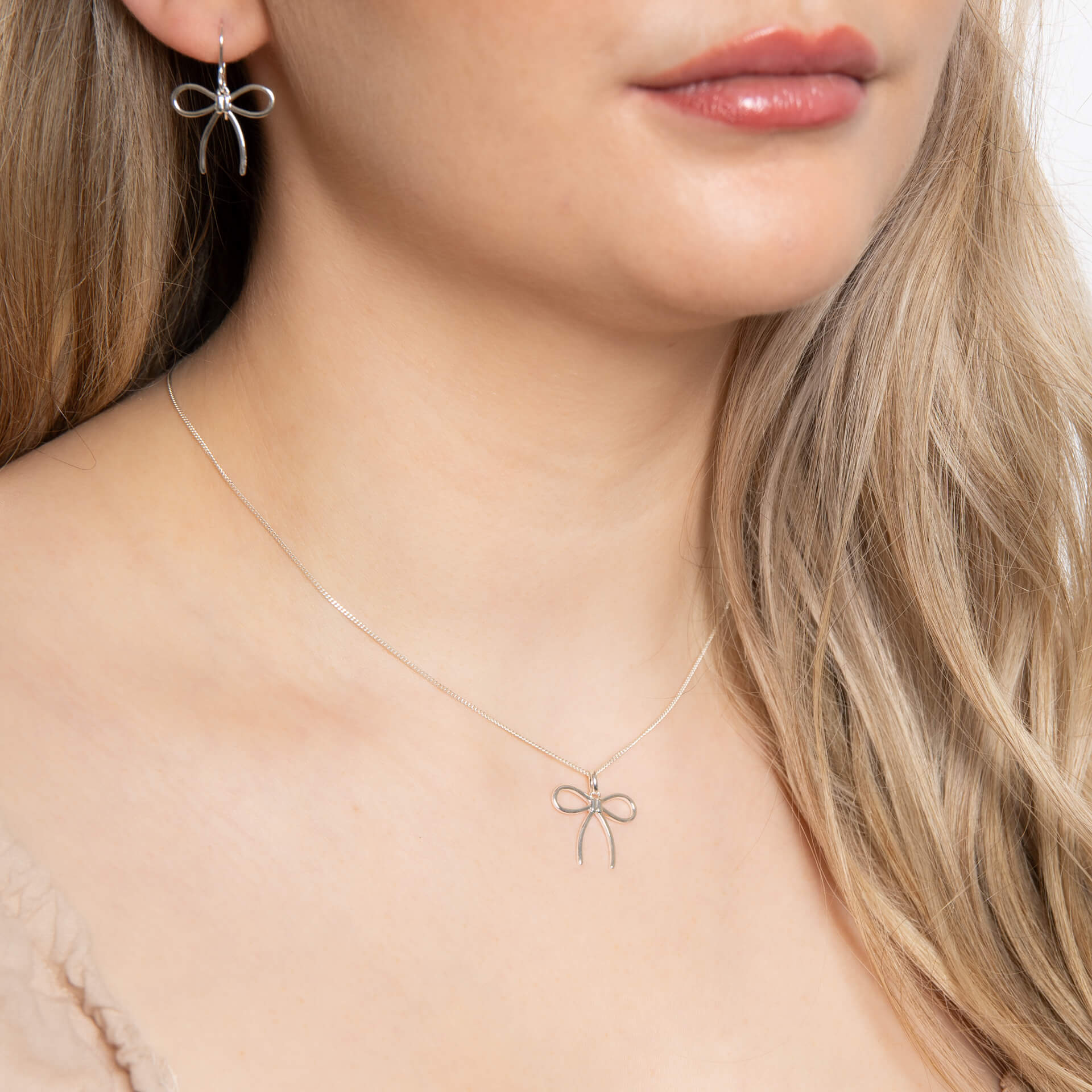 Thin Bow Pendant