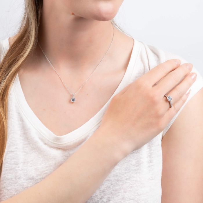 Oval Cut Solitaire Ring with Pave Shoulders